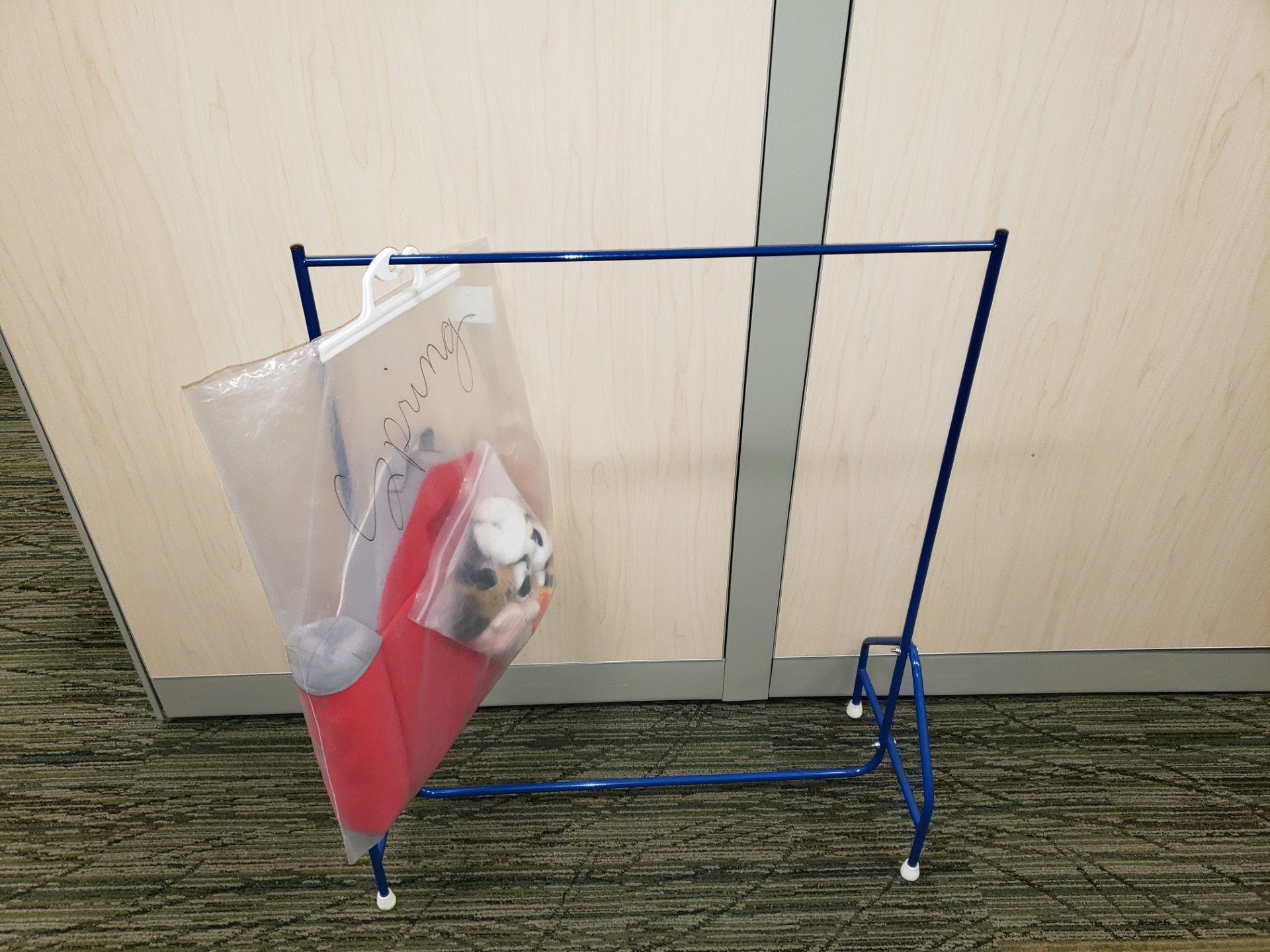 Hanging Bag Stand Reaching Across Illinois Library System